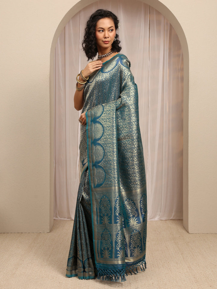 Teal Woven Design Silk Blend Saree With Unstitched Blouse Piece