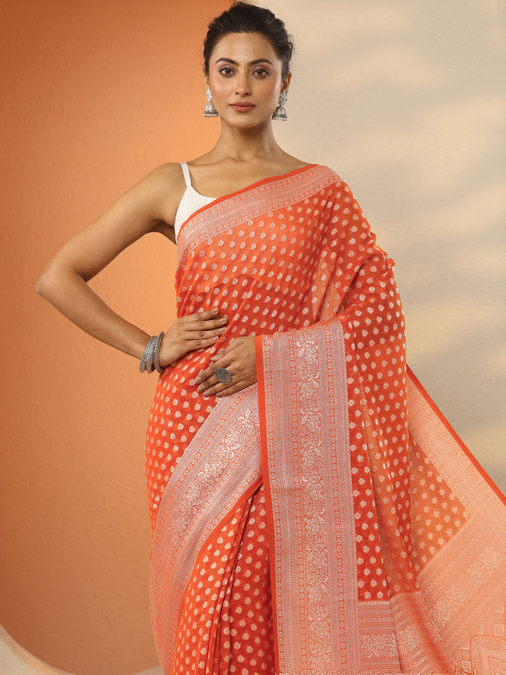Orange Woven Design Pure Georgette Saree With Unstitched Blouse Piece