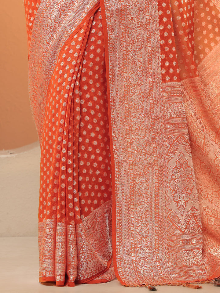 Orange Woven Design Pure Georgette Saree With Unstitched Blouse Piece