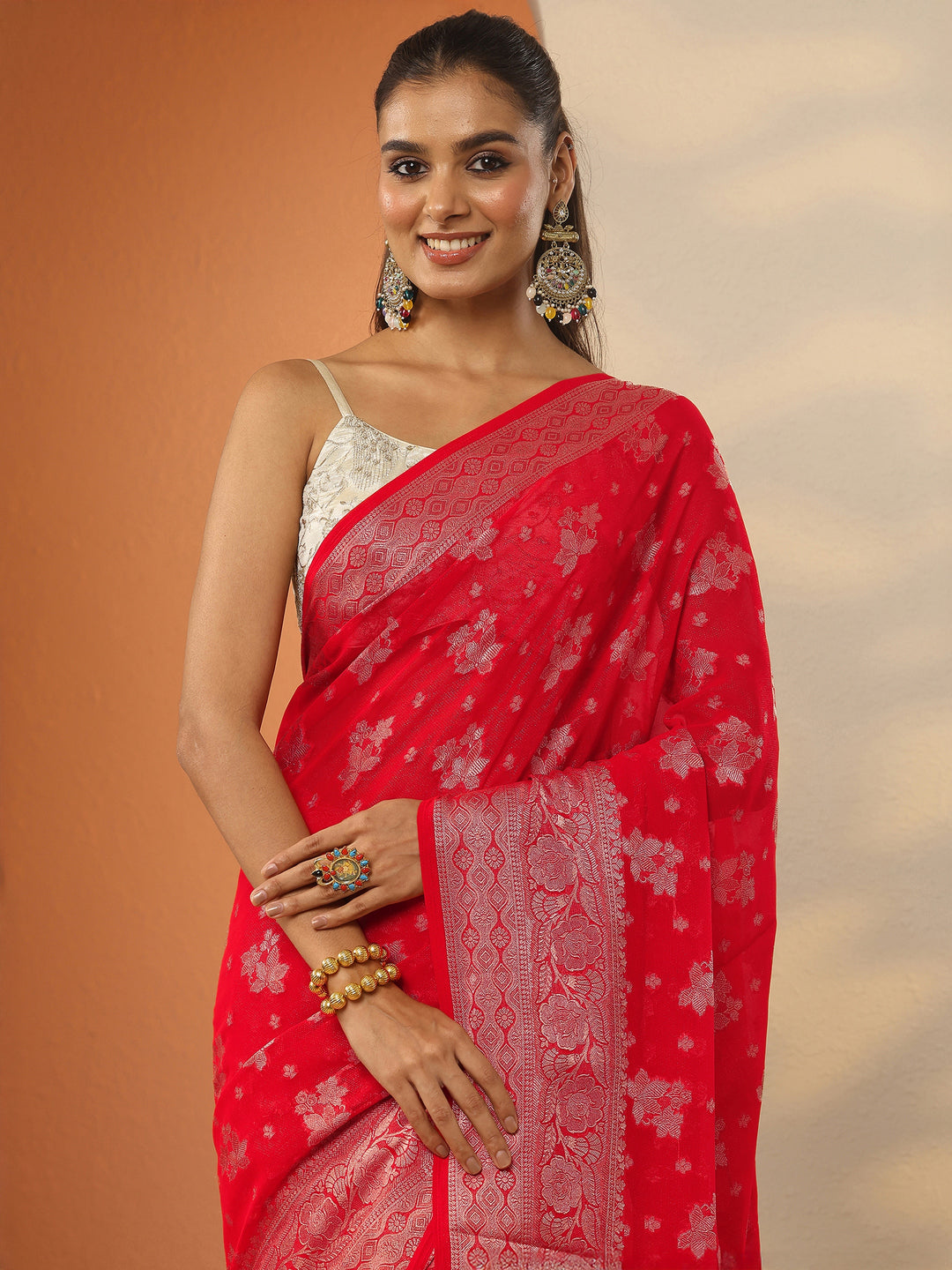 Red Woven Design Pure Georgette Saree With Unstitched Blouse Piece