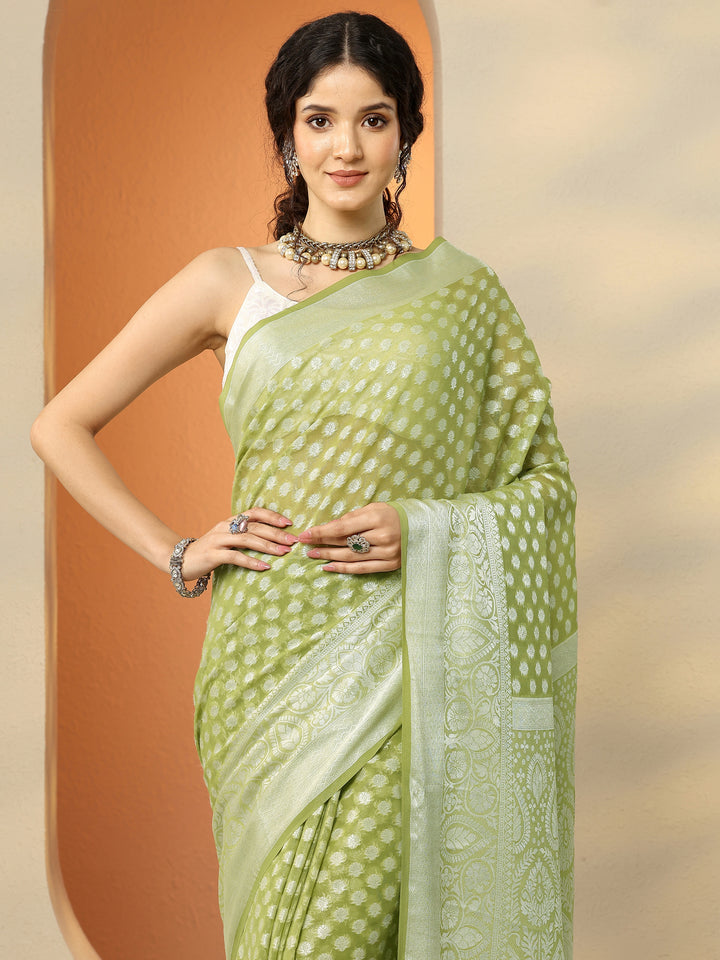 Green Woven Design Georgette Saree With Unstitched Blouse Piece