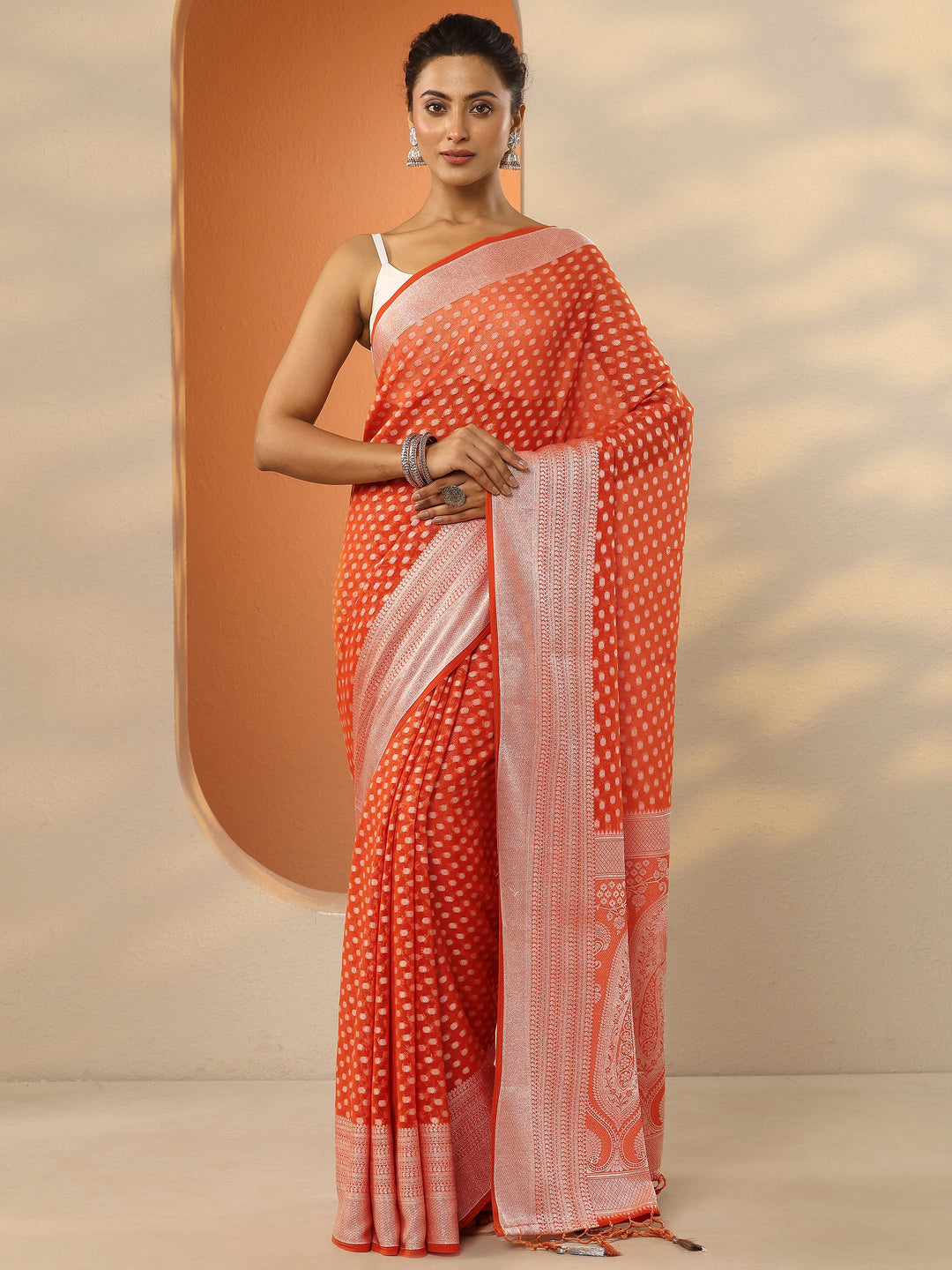 Orange Woven Design Pure Georgette Saree With Unstitched Blouse Piece