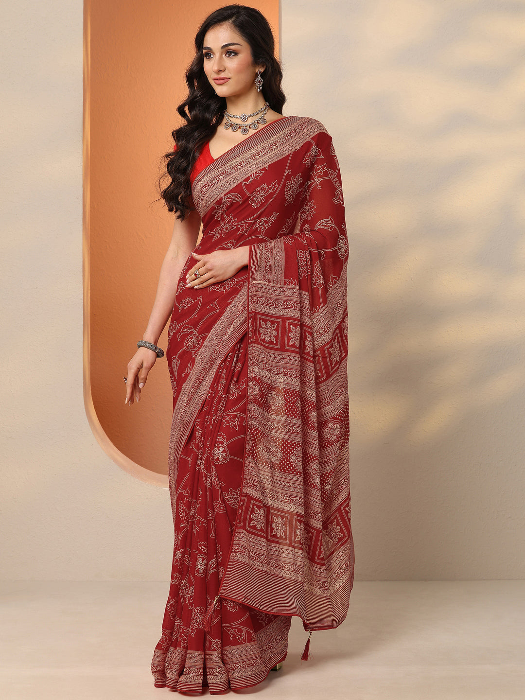 Red Printed Georgette Saree With Unstitched Blouse Piece