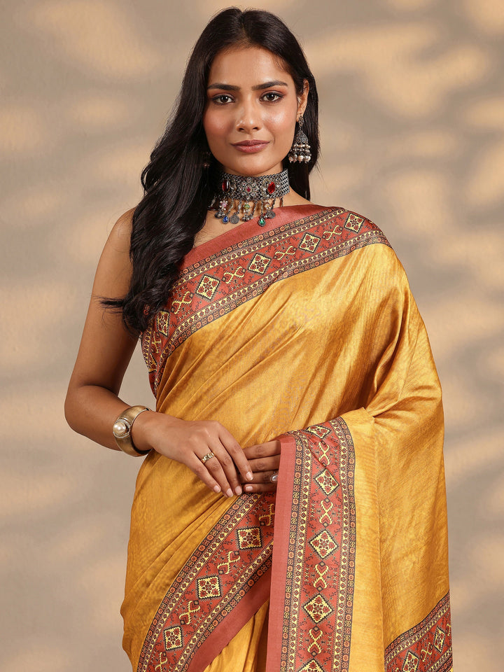 Mustard Woven Design Silk Blend Saree With Unstitched Blouse Piece
