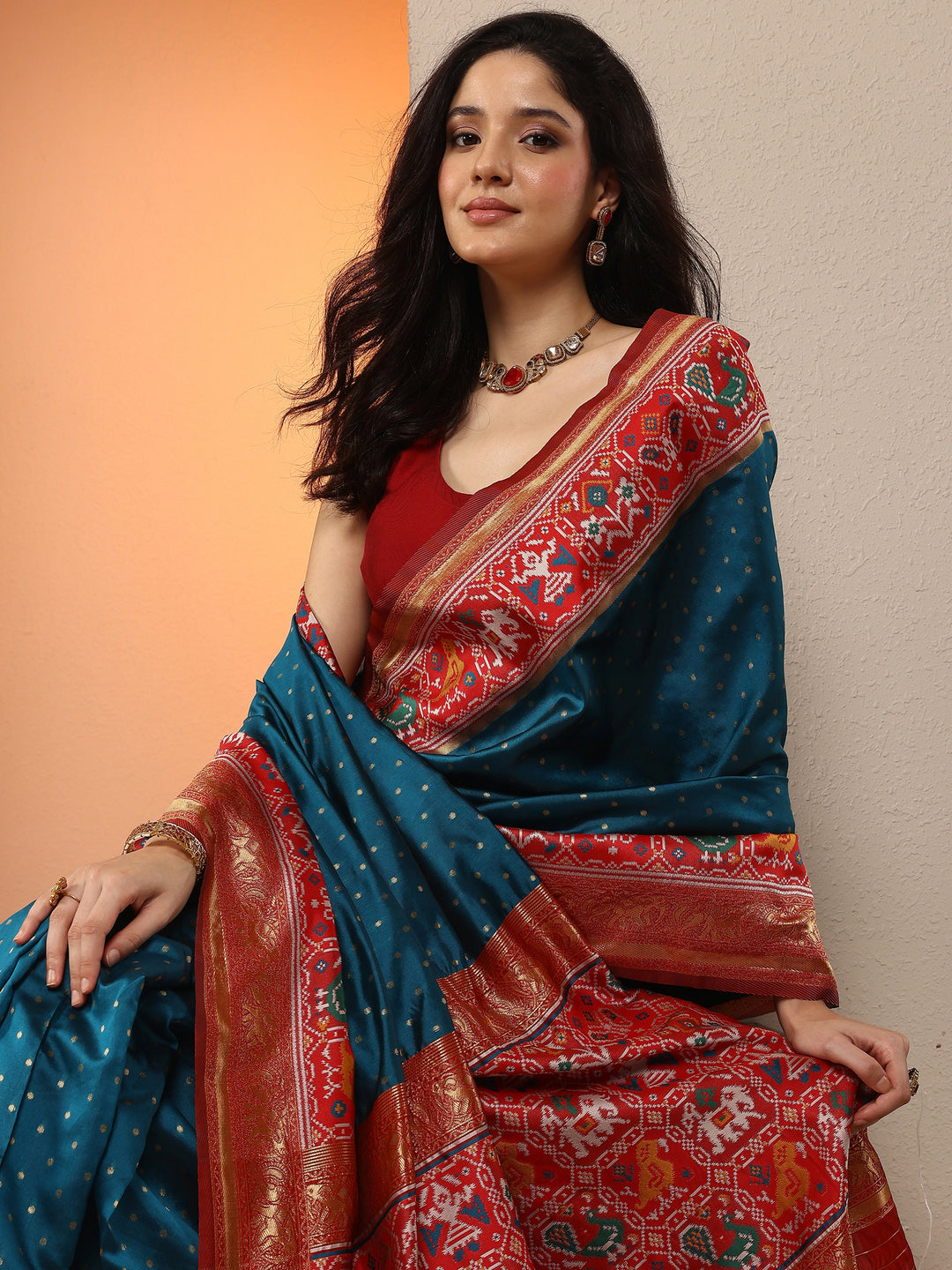 Teal  Woven Design Silk Blend Saree With Unstitched Blouse Piece