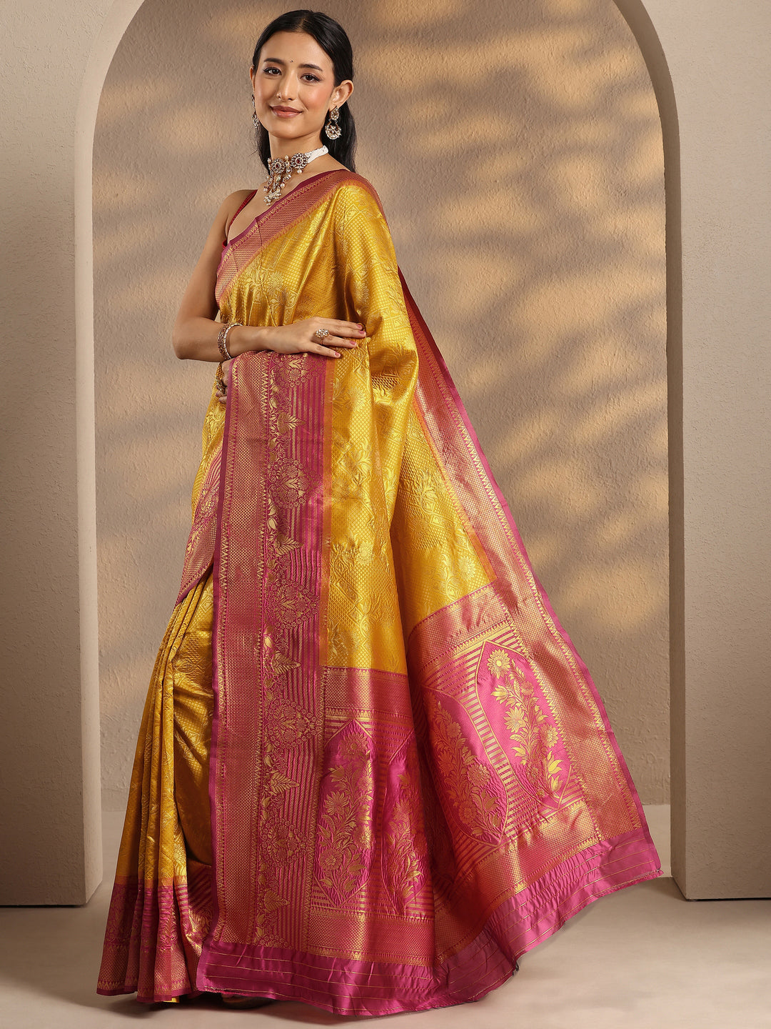 Mustard Woven Design Silk Blend Banarasi Saree With Unstitched Blouse Piece