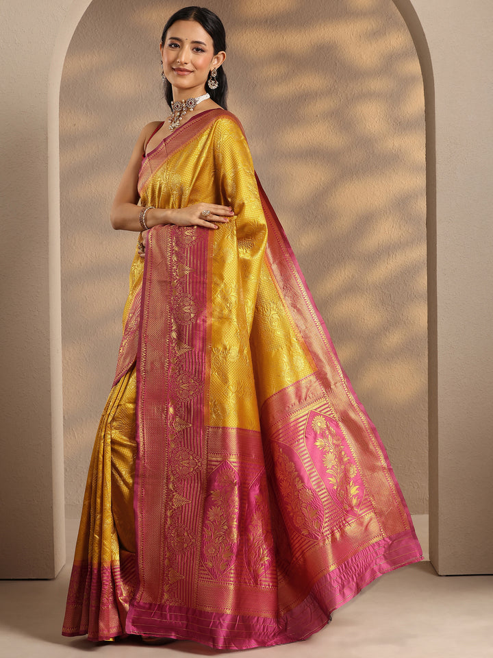 Mustard Woven Design Silk Blend Banarasi Saree With Unstitched Blouse Piece