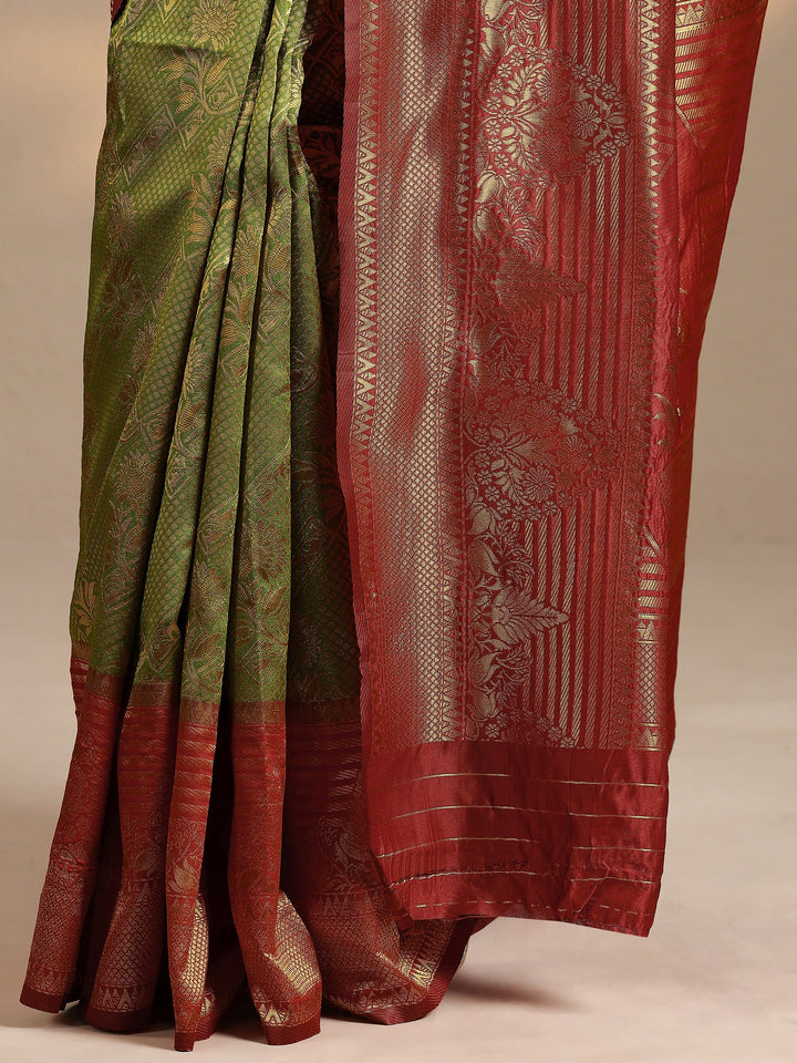 Green Woven Design Silk Blend Saree With Unstitched Blouse Piece