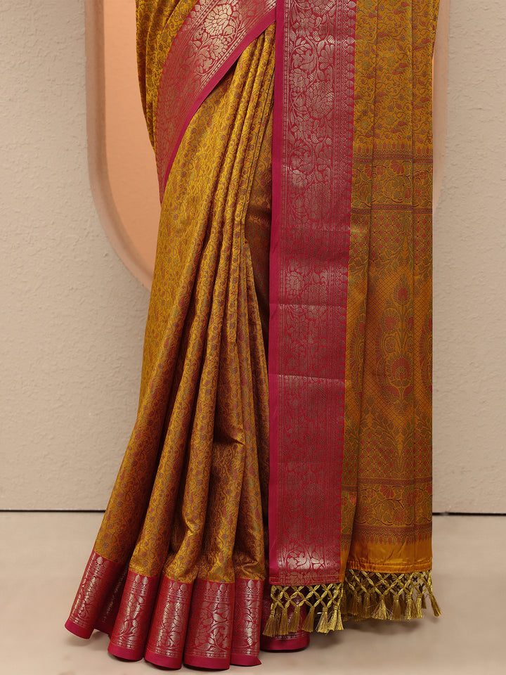 Mustard Woven Design Silk Blend Saree With Unstitched Blouse Piece