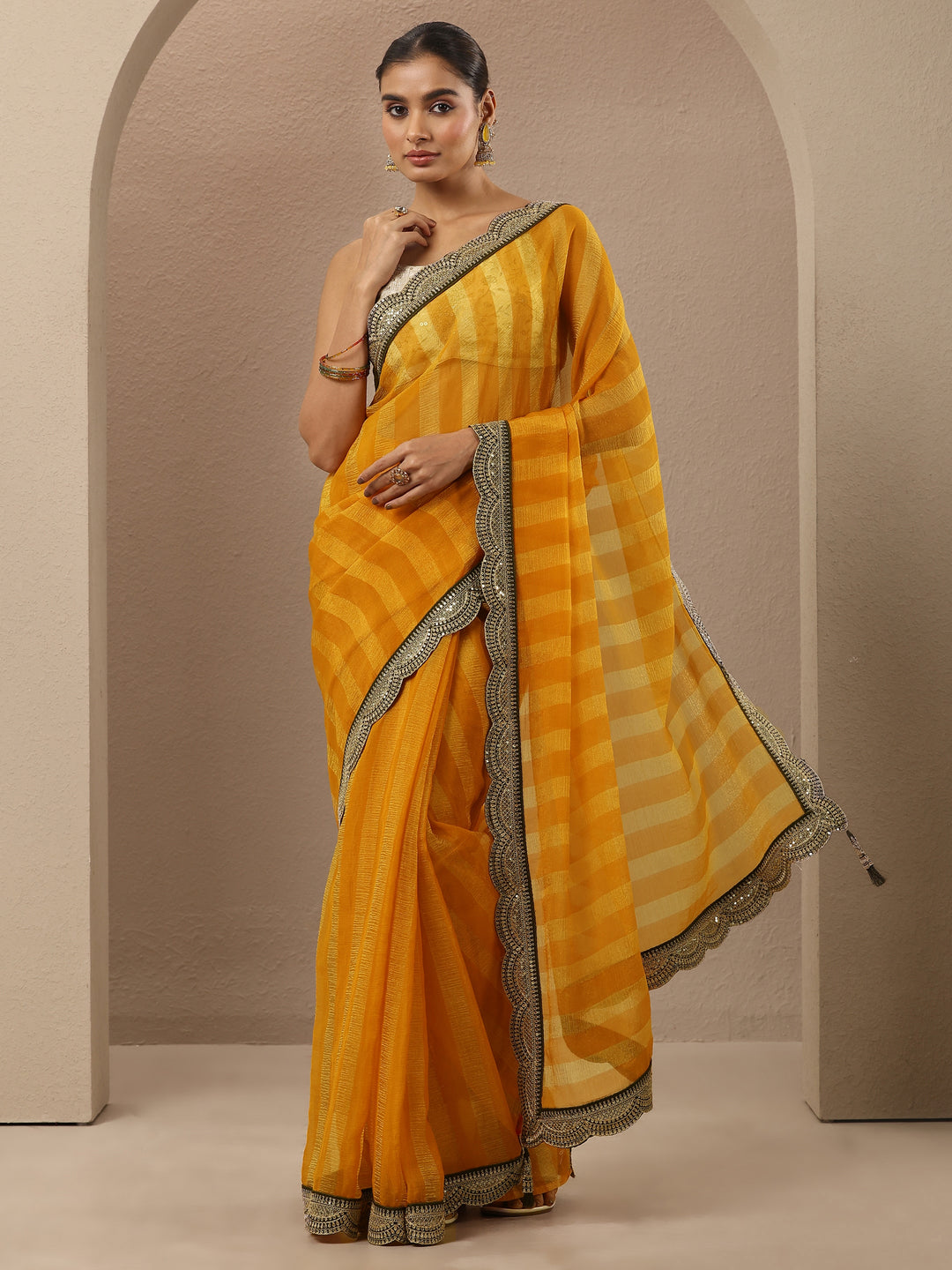 Yellow Striped Embellished Silk Blend Saree With Unstitched Blouse Piece