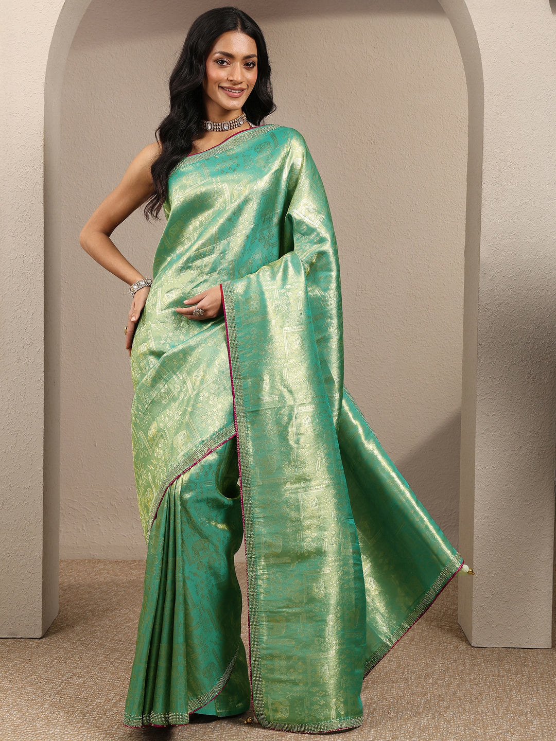 Green Woven Design Banarsi Silk Blend Saree With Unstitched Blouse Piece