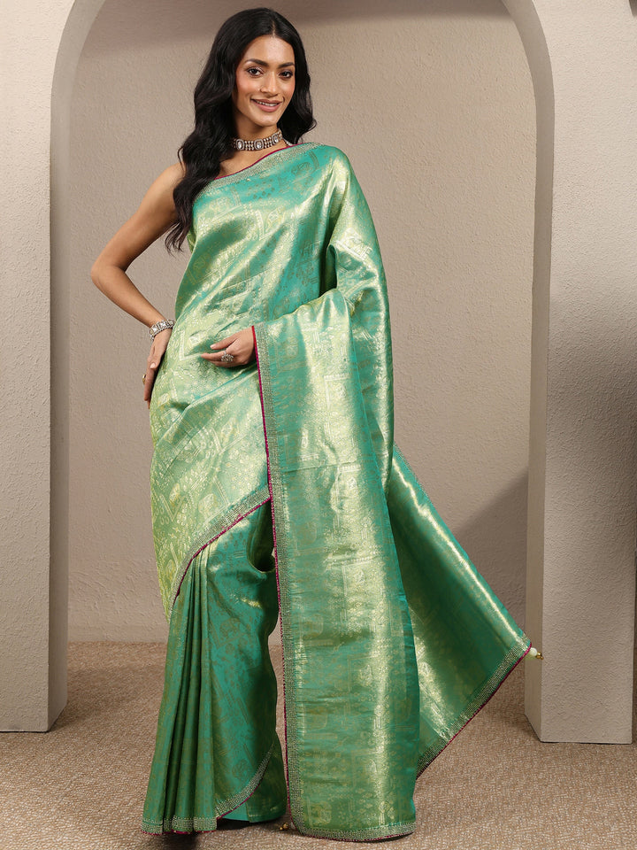 Green Woven Design Banarsi Silk Blend Saree With Unstitched Blouse Piece