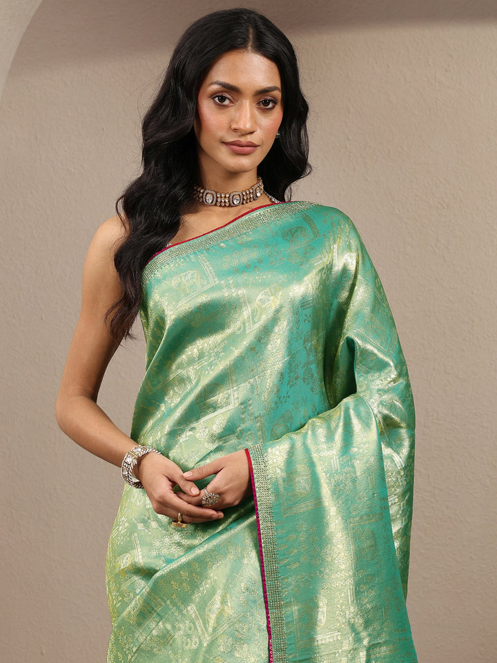 Green Woven Design Banarsi Silk Blend Saree With Unstitched Blouse Piece
