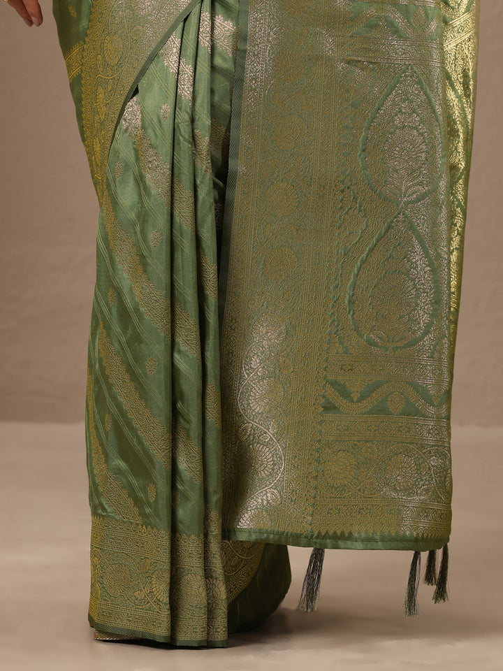 Green Woven Design Silk Blend Saree With Unstitched Blouse Piece