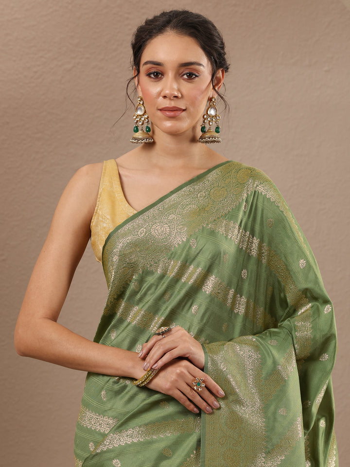 Green Woven Design Silk Blend Saree With Unstitched Blouse Piece