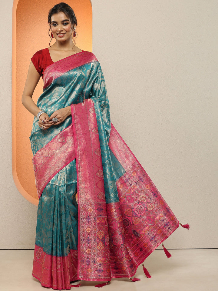 Teal Woven Design Silk Blend Sarees With Unstitched Blouse Piece