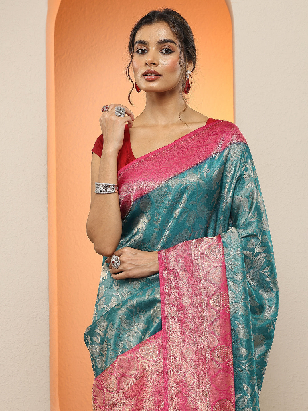 Teal Woven Design Silk Blend Sarees With Unstitched Blouse Piece