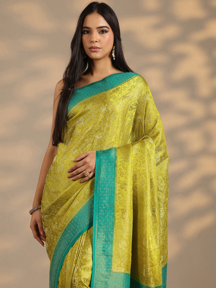 Green Woven Design Silk Blend Saree With Unstitched Blouse Piece