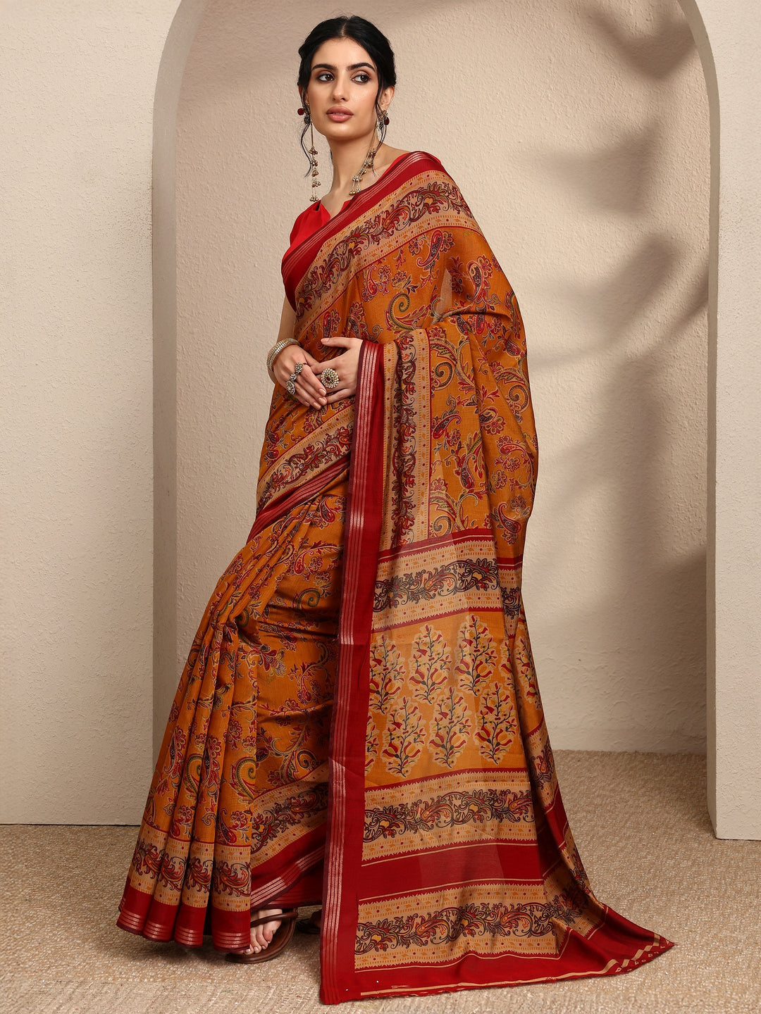 Mustard Paisley Printed Silk Blend Saree With Unstitched Blouse Piece