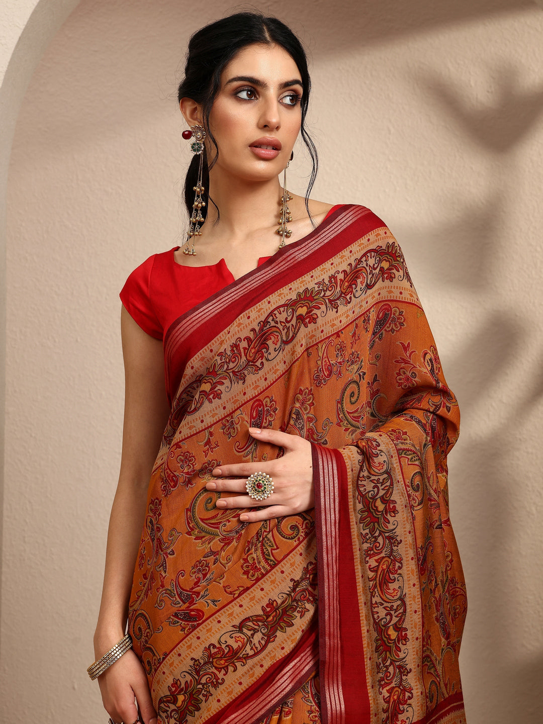 Mustard Paisley Printed Silk Blend Saree With Unstitched Blouse Piece