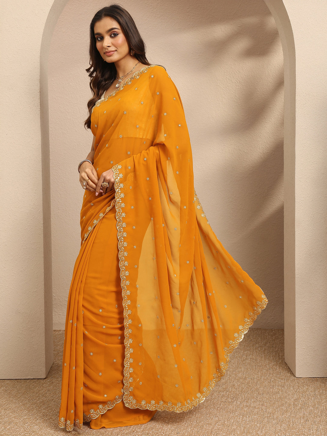 Mustard Embroidered Georgette Saree With Unstitched Blouse Piece