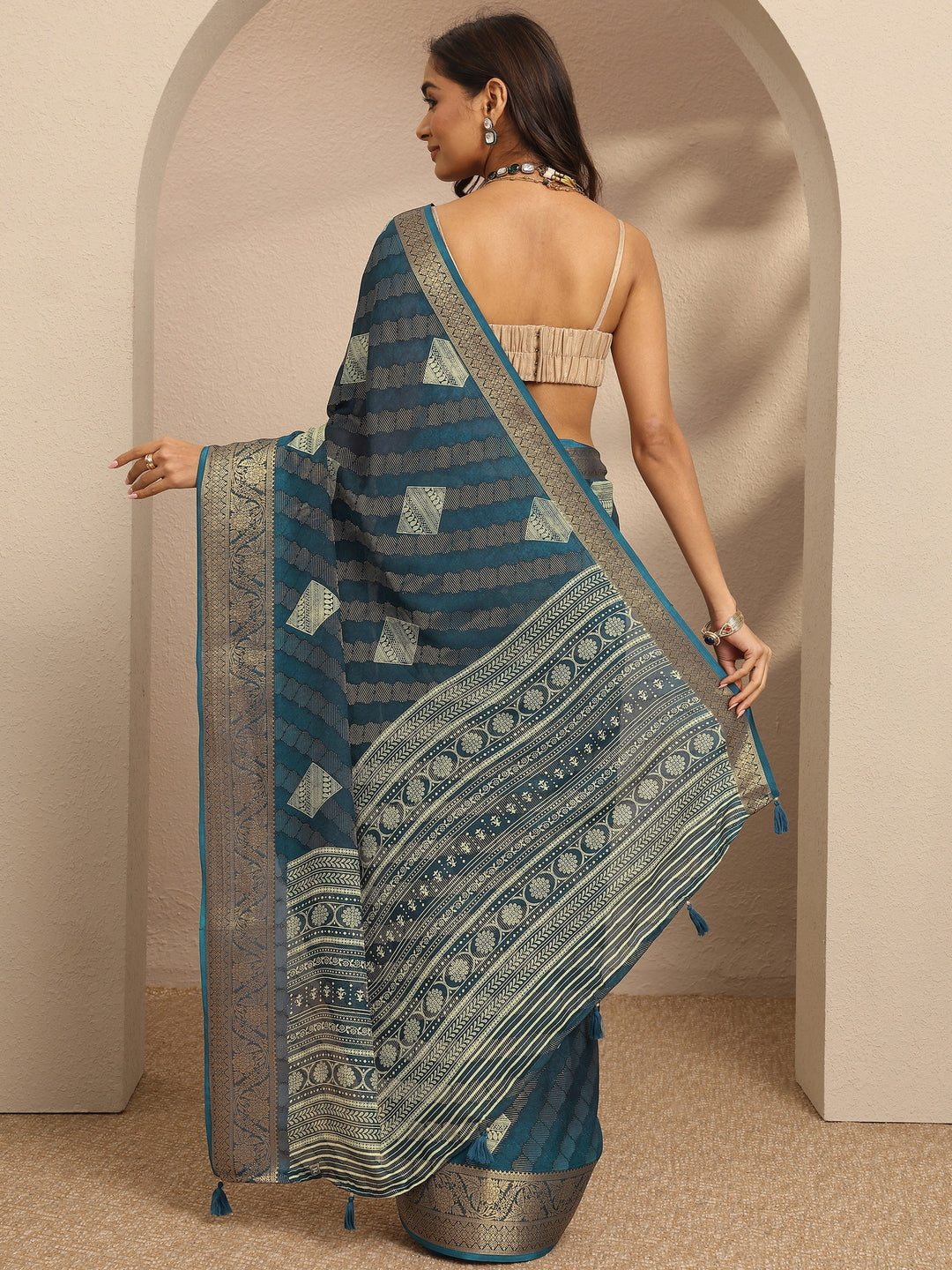 Blue Paisley Woven Design Georgette Saree With Unstitched Blouse Piece