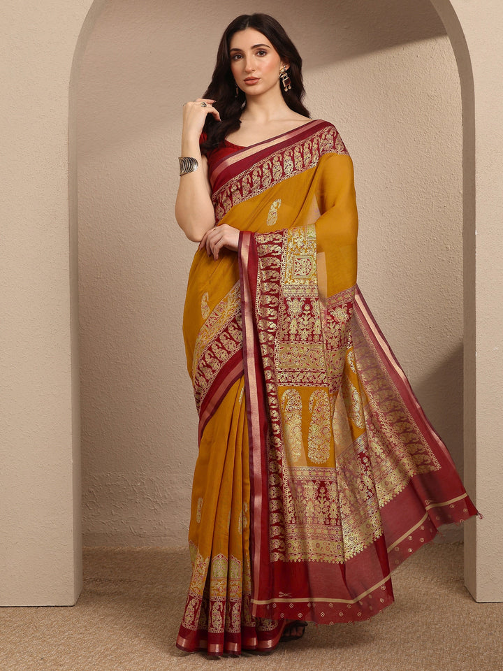 Mustard Paisley Woven Design Banarsi Silk Blend Saree With Unstitched Blouse Piece