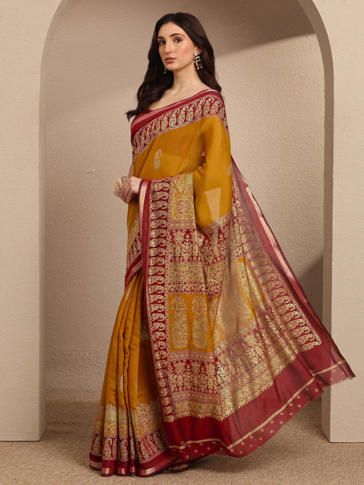 Mustard Paisley Woven Design Banarsi Silk Blend Saree With Unstitched Blouse Piece