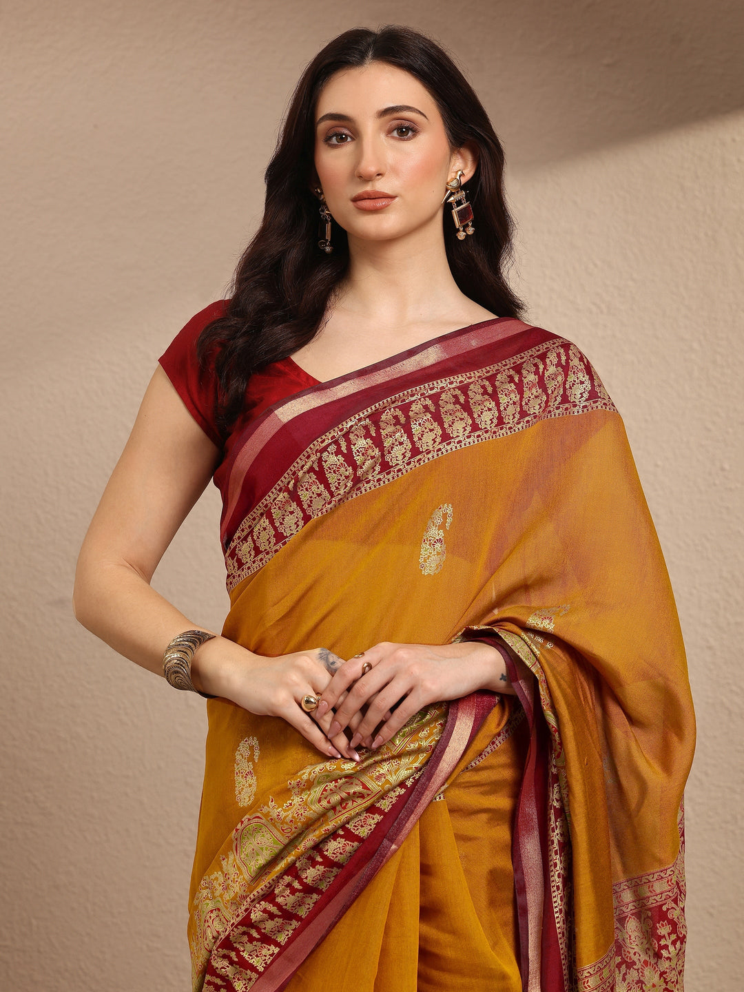 Mustard Paisley Woven Design Banarsi Silk Blend Saree With Unstitched Blouse Piece