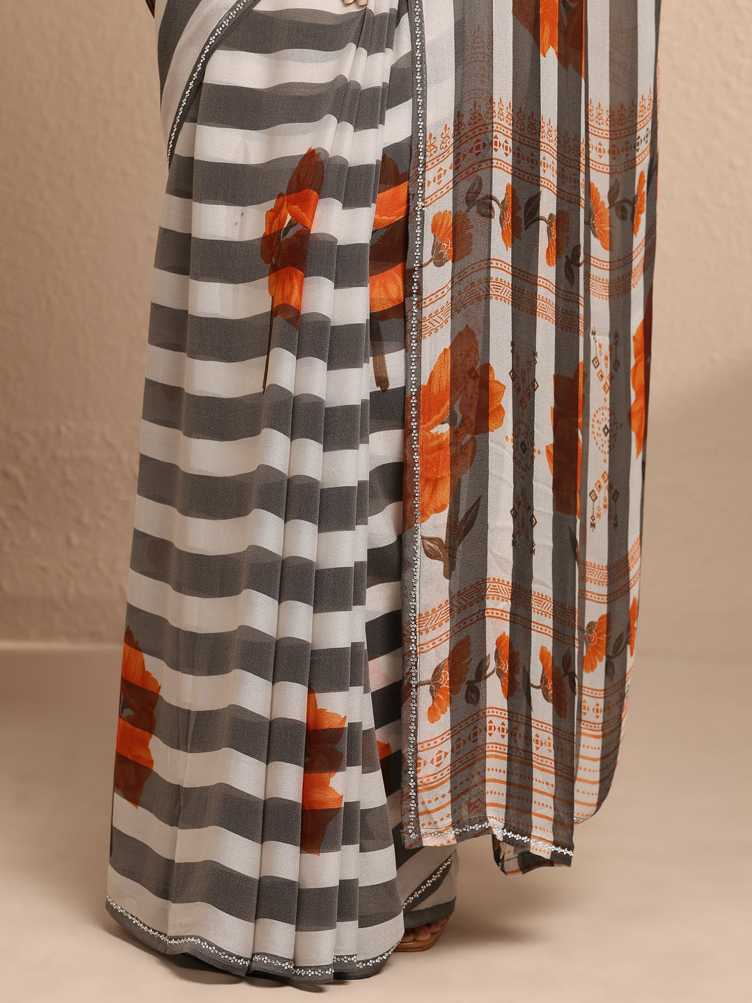 White Printed Georgette Saree With Unstitched Blouse Piece