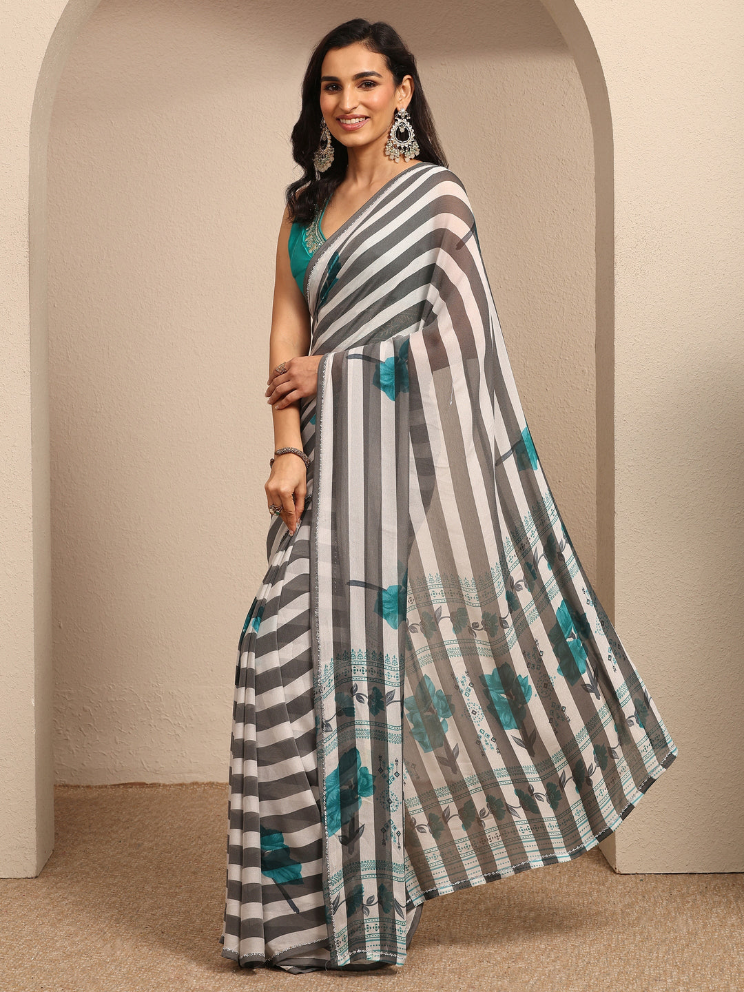 White Printed Georgette Saree With Unstitched Blouse Piece