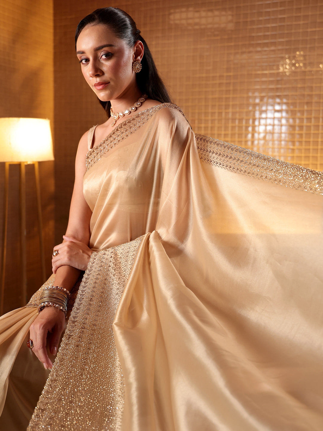 Libas Art Beige Solid Tissue Saree