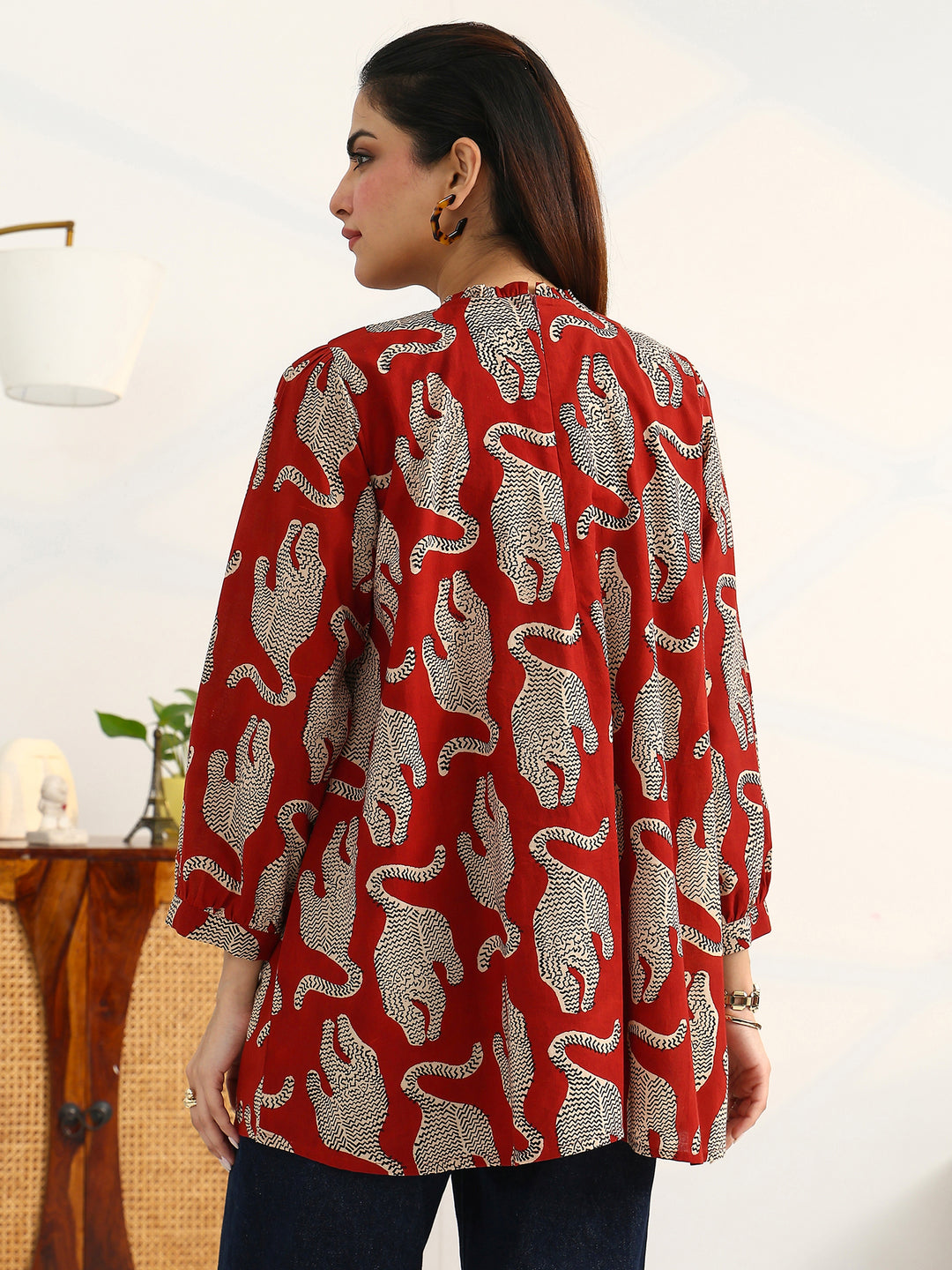 Rust Tribal Printed Cotton Blend Straight Short Kurti