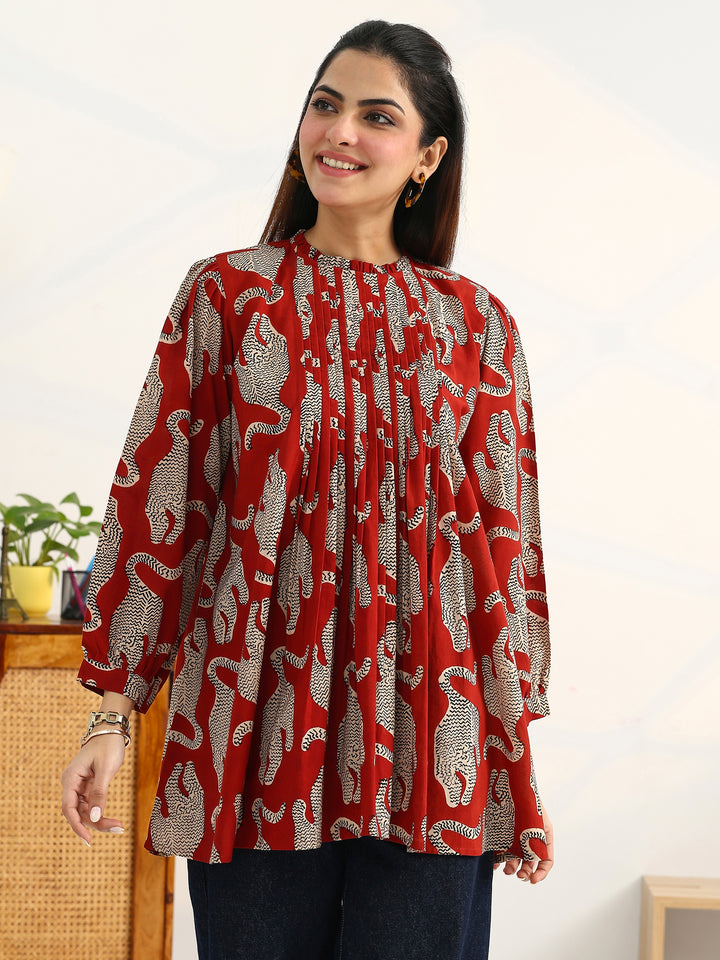 Rust Tribal Printed Cotton Blend Straight Short Kurti