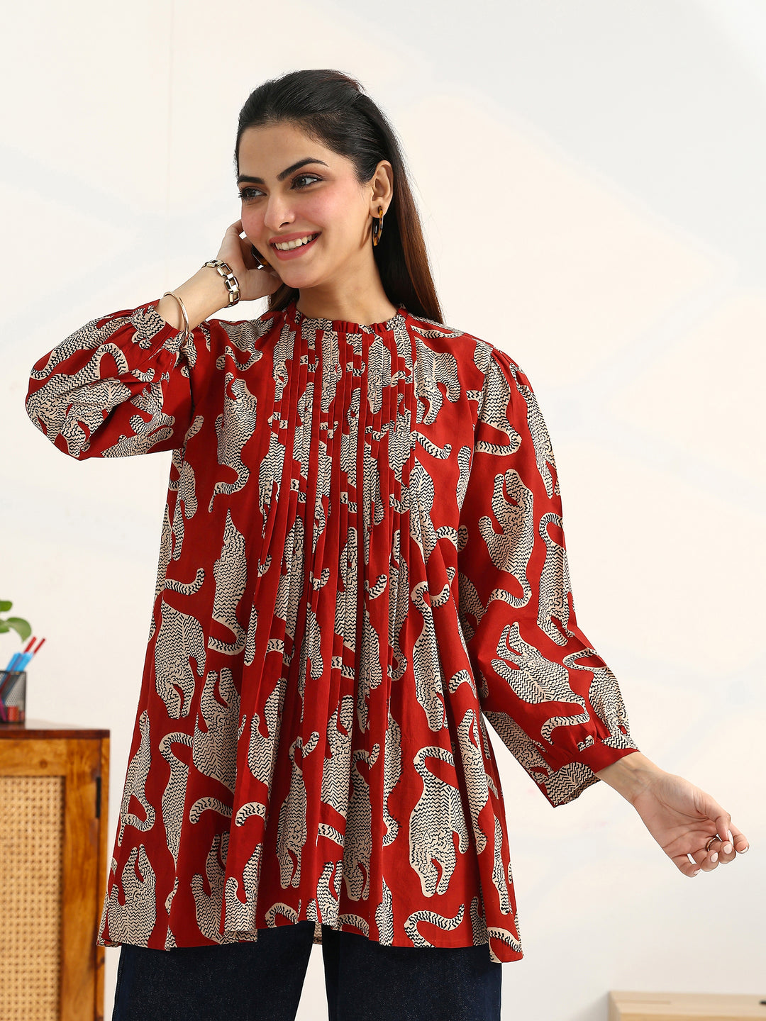 Rust Tribal Printed Cotton Blend Straight Short Kurti