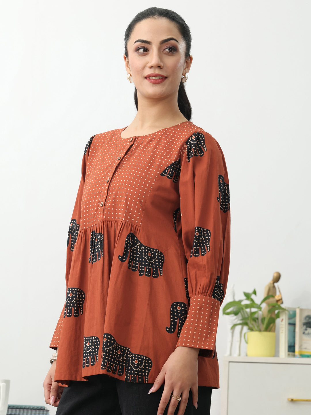 Rust Tribal Printed Cotton Blend A-Line Short Kurti