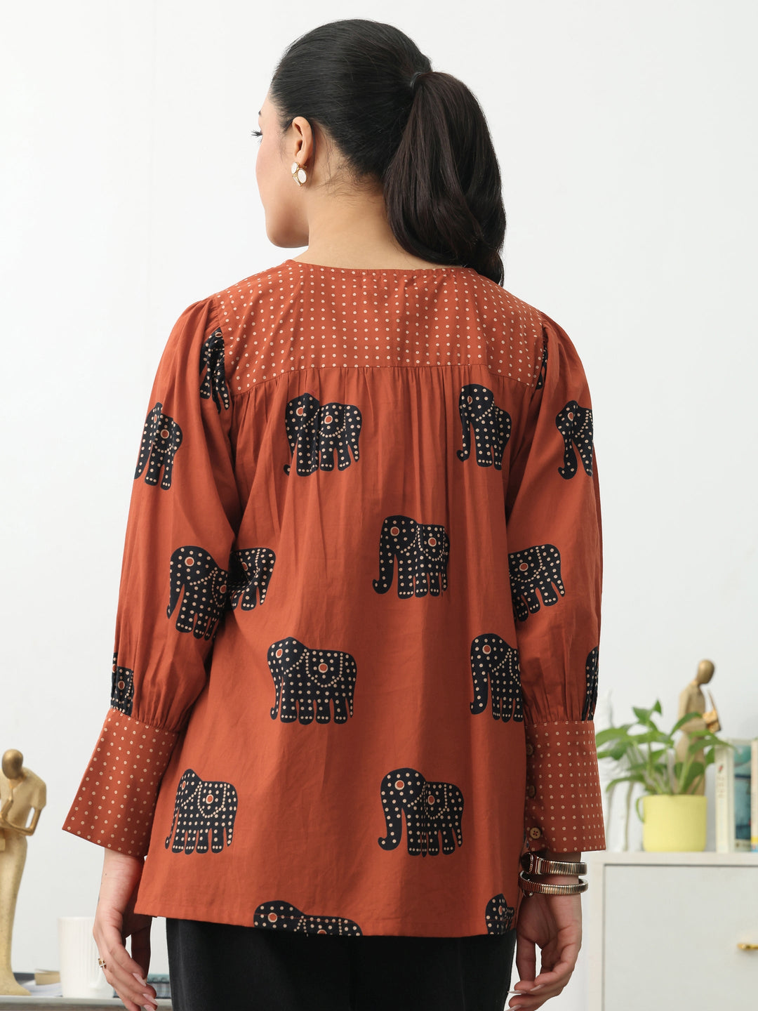 Rust Tribal Printed Cotton Blend A-Line Short Kurti