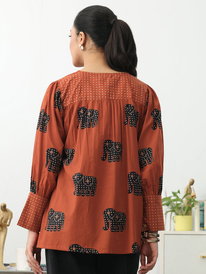 Rust Tribal Printed Cotton Blend A-Line Short Kurti