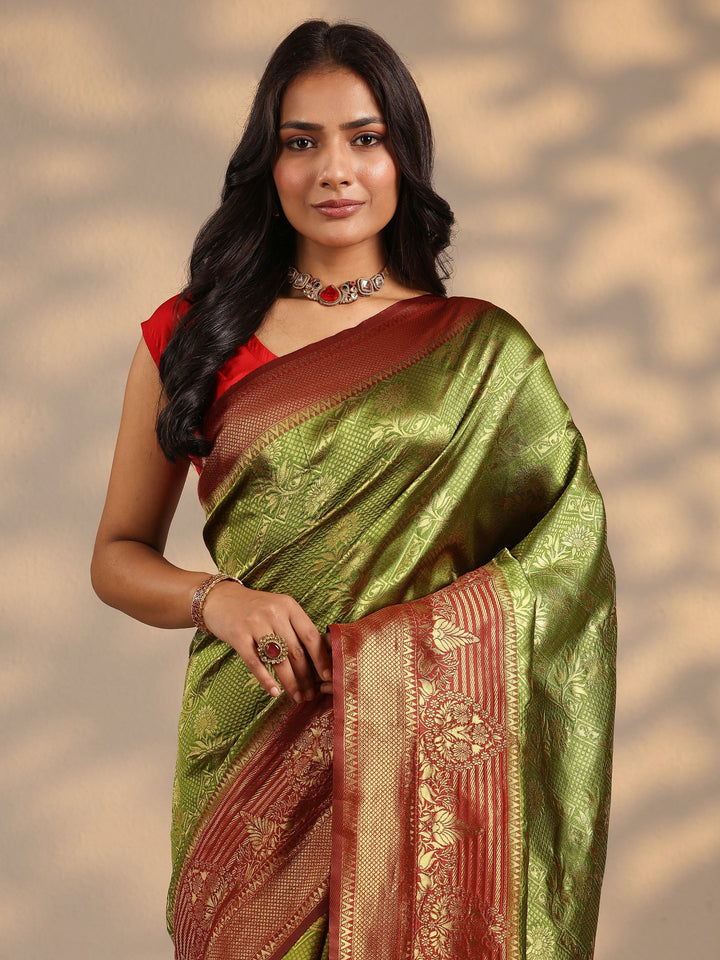 Green Woven Design Silk Blend Saree With Unstitched Blouse Piece