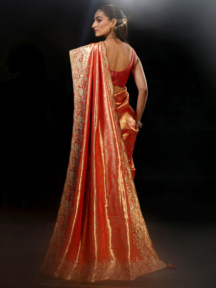 Libas Apricot Orange Woven Design Satin Saree with Embellished Border