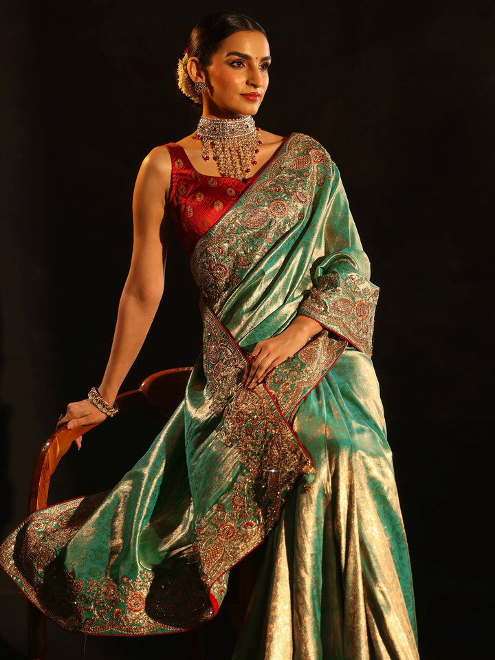Libas Aqua Blue Woven Design Satin Saree with Embellished Border