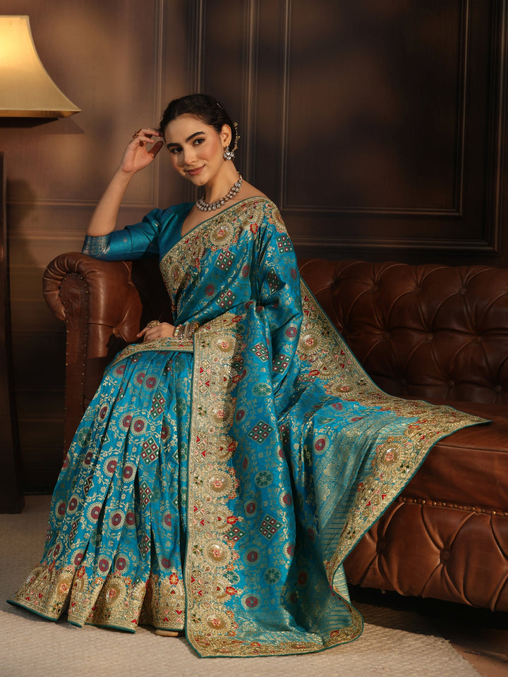 Libas Art Turquoise Woven Design Silk Blend Saree with Embellished Border