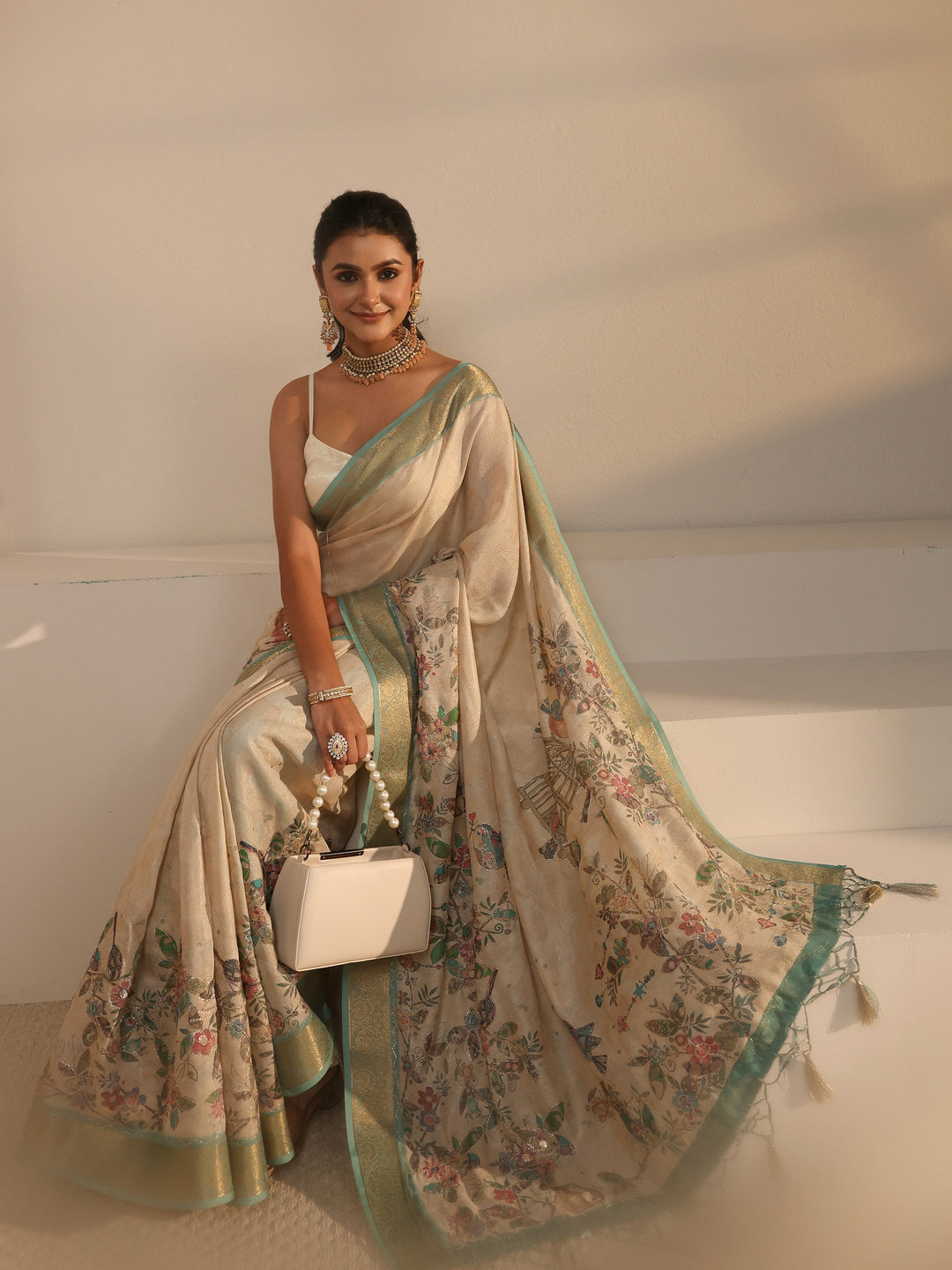 Libas Beige Floral Printed Silk Blend Tassel Saree with Woven Border