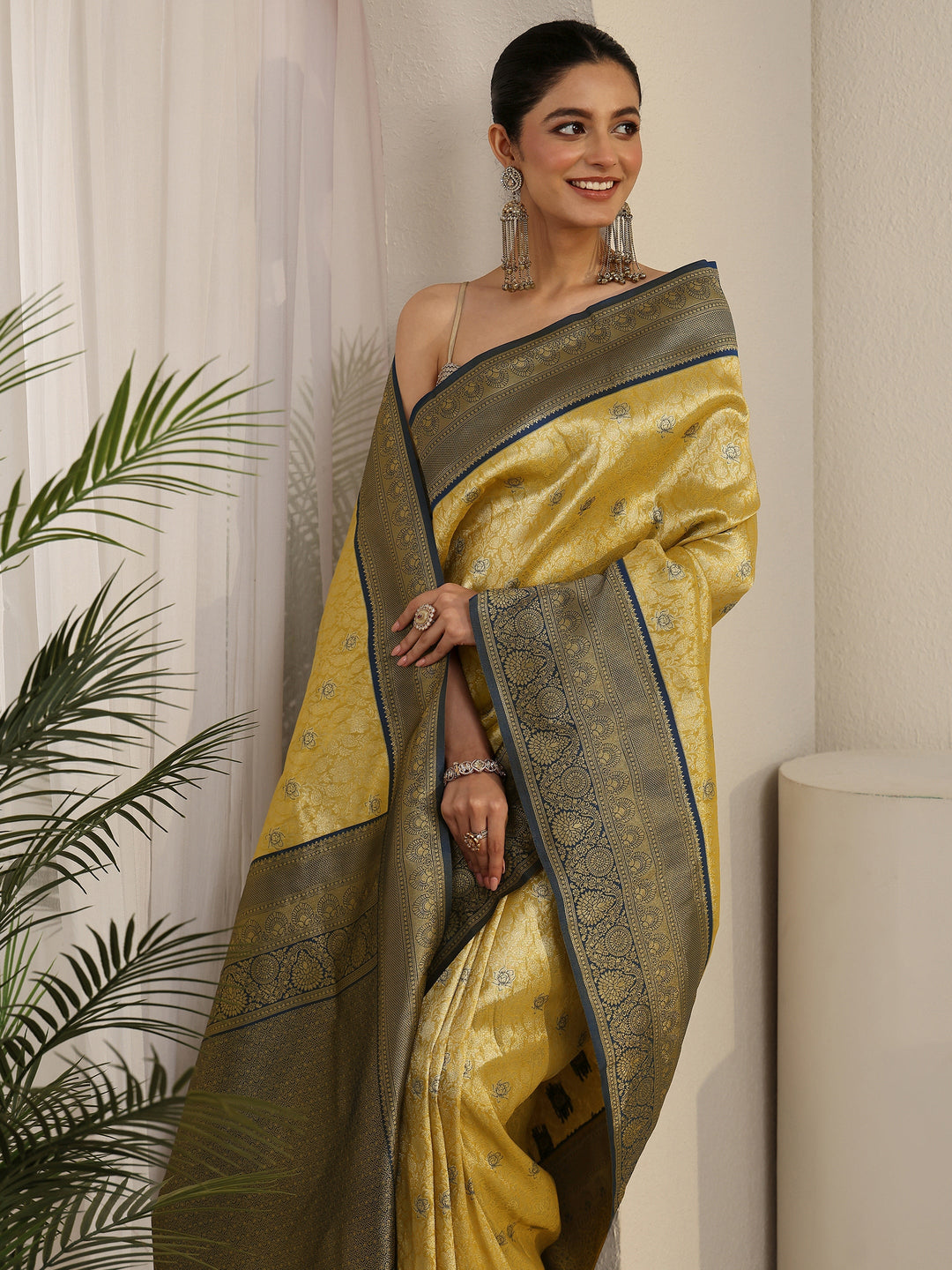 Libas Mustard and Blue Floral Woven Design Silk Blend Saree