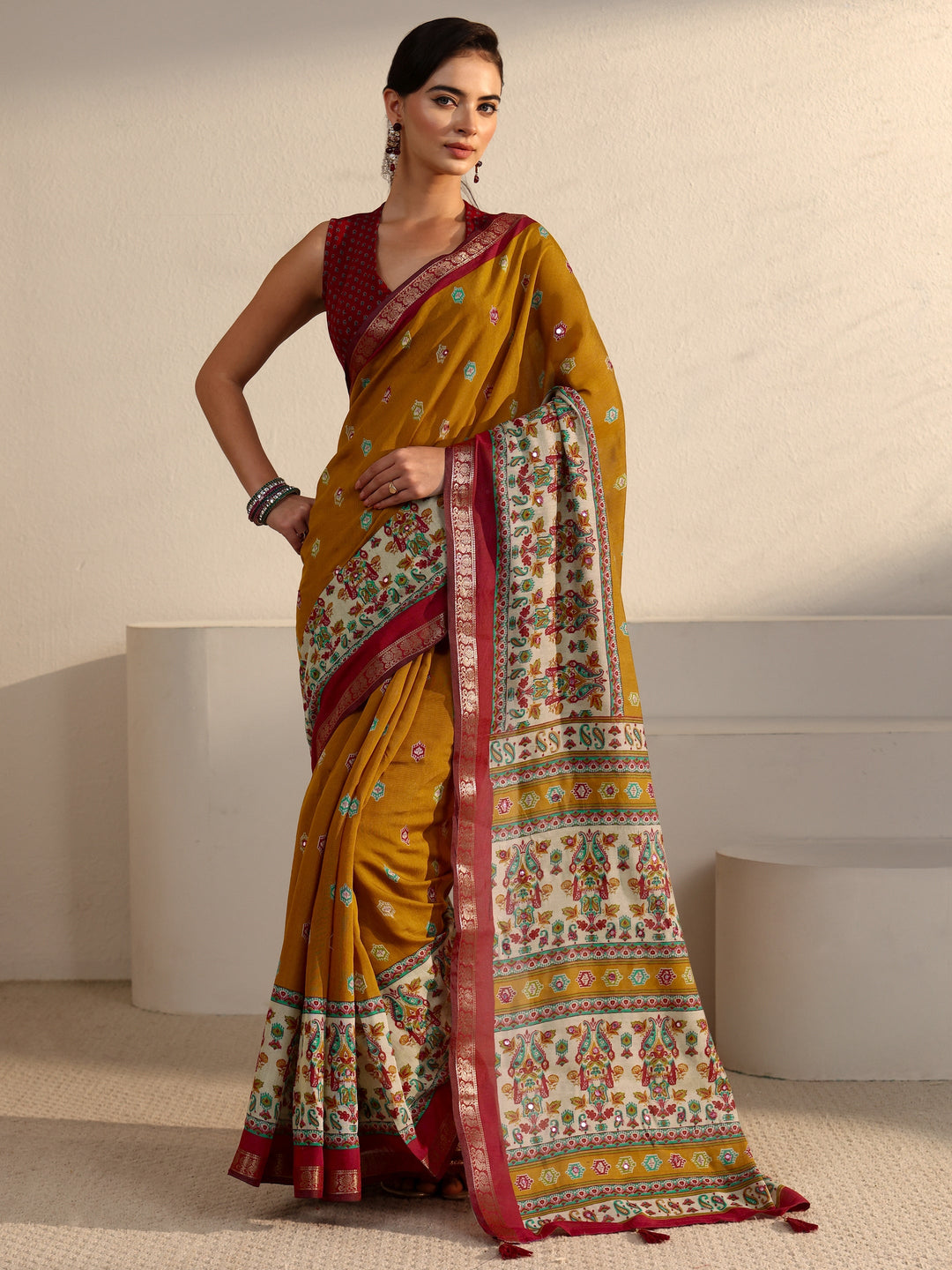 Libas Mustard and Red Printed Mirror Work Silk Blend Tassel Saree