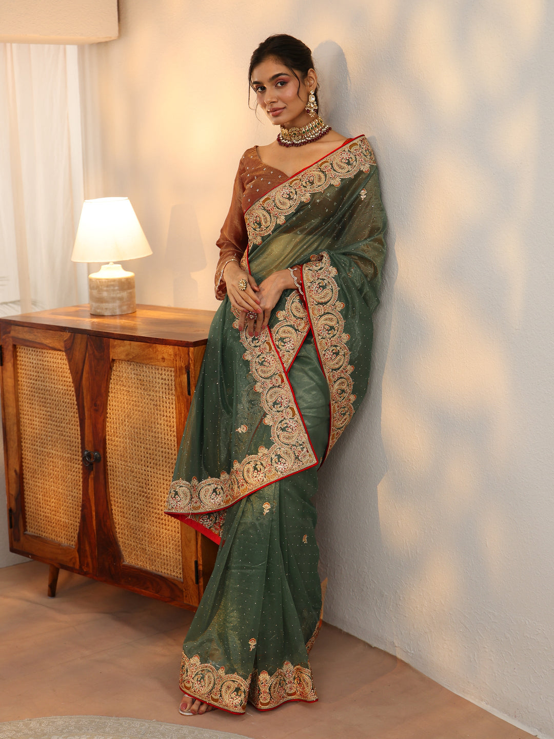 Libas Olive Green Net Saree with Embellished Paisley Border