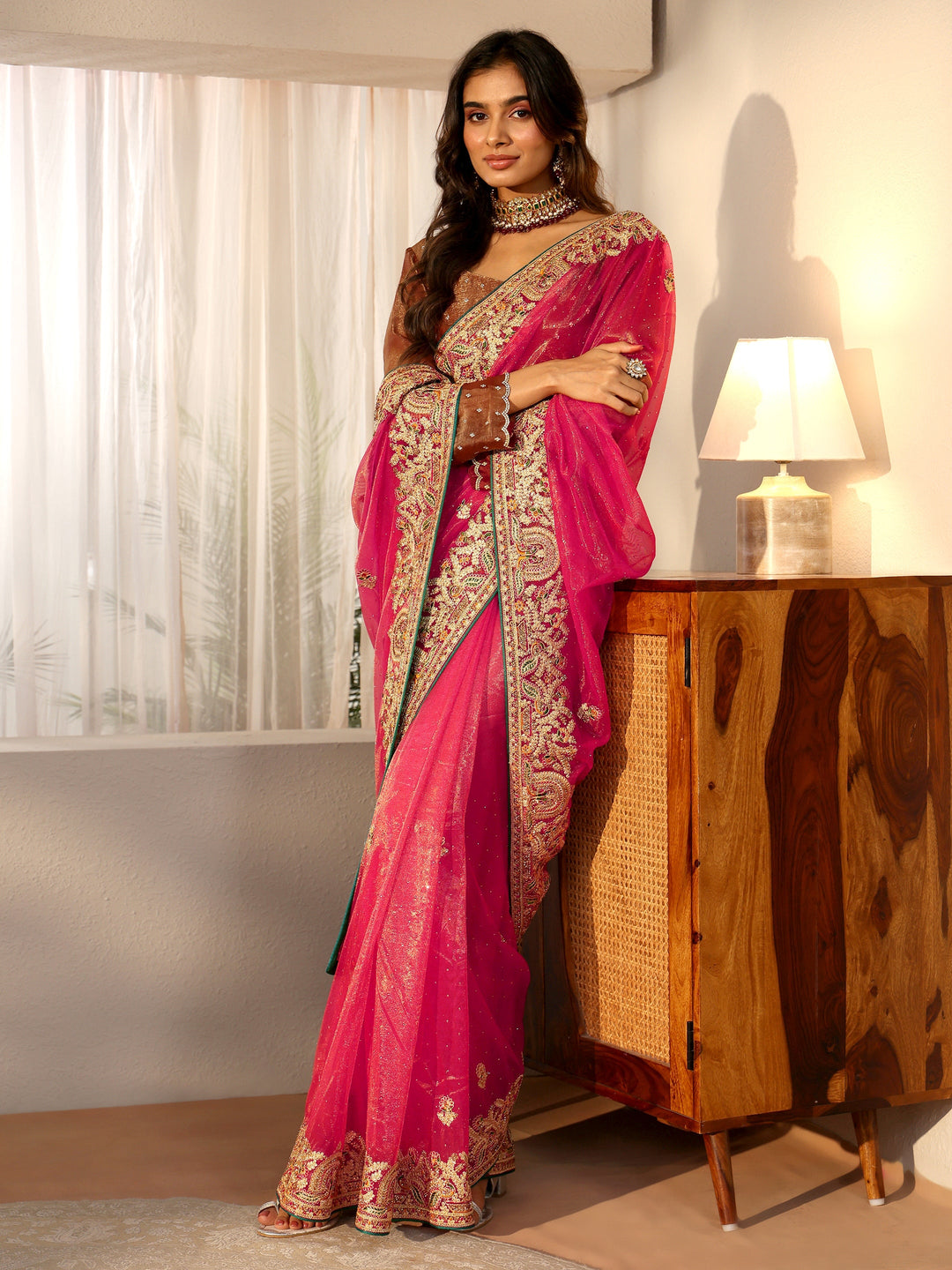 Libas Peach Net Saree with Embroidered Border