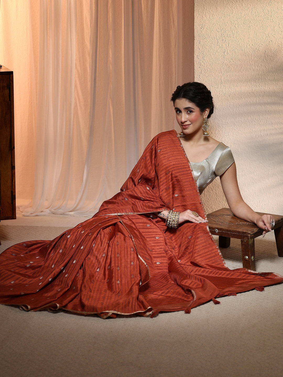 Libas Rust Leaf Woven Design Textured Silk Blend Tassel Saree