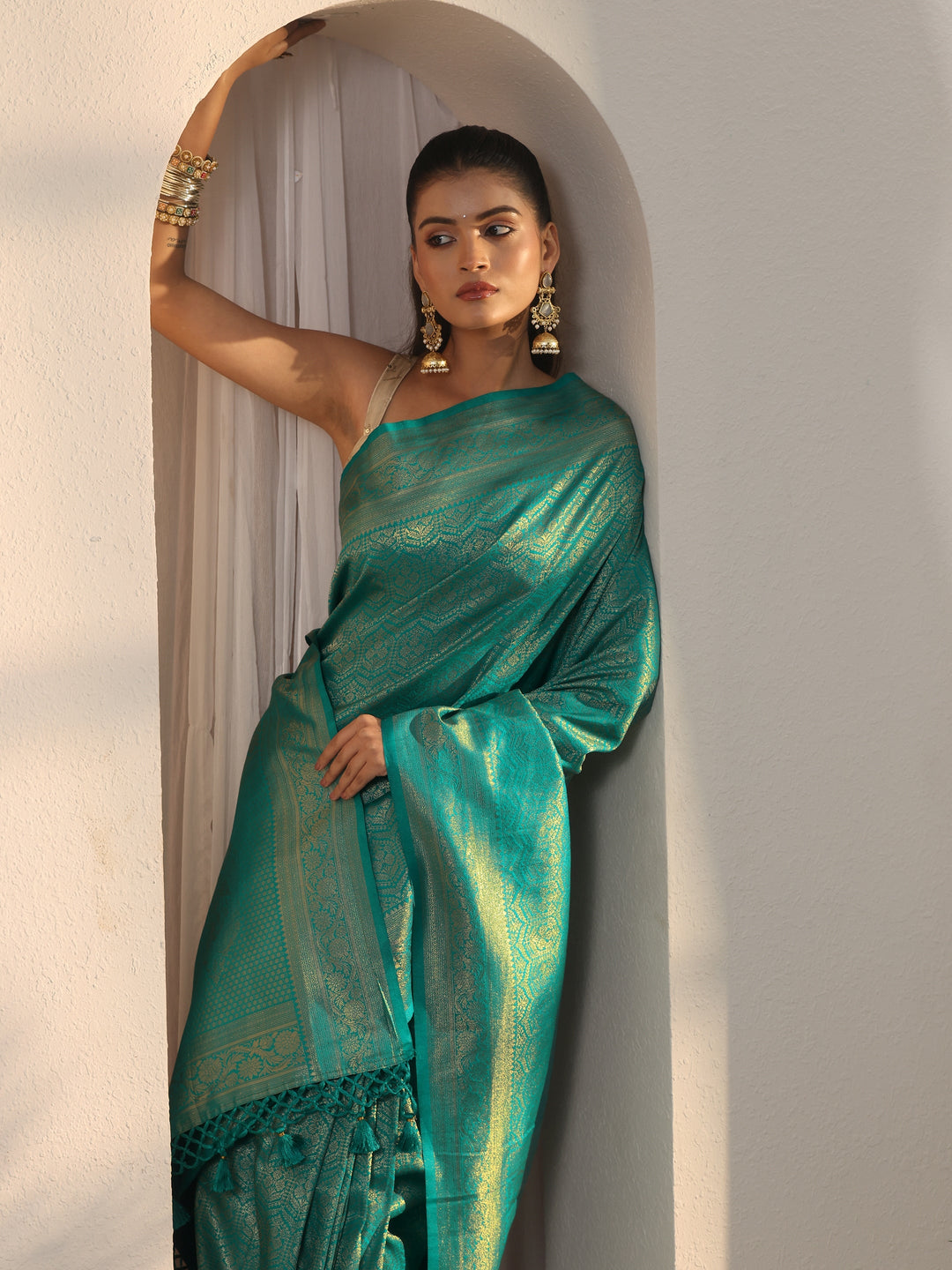 Libas Sea Green Woven Design Silk Blend Tassel Saree
