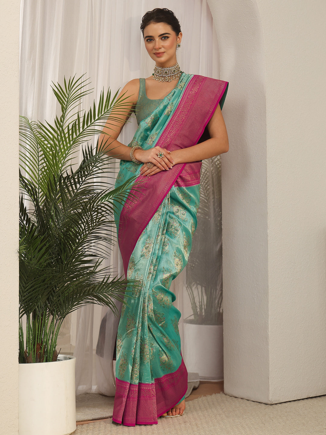 Libas Turquoise and Pink Floral Woven Design Silk Blend Saree